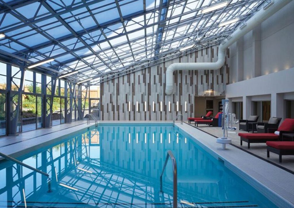 Hilton Delights Guests with Newly Renovated Pool Enclosure by OpenAire featured image