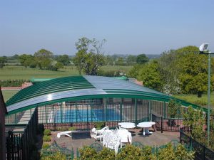 Creating Year-Round Fitness Programming 1 OpenAire's retractable roof over the pool at Stock Brook Manor in Billericay, England.